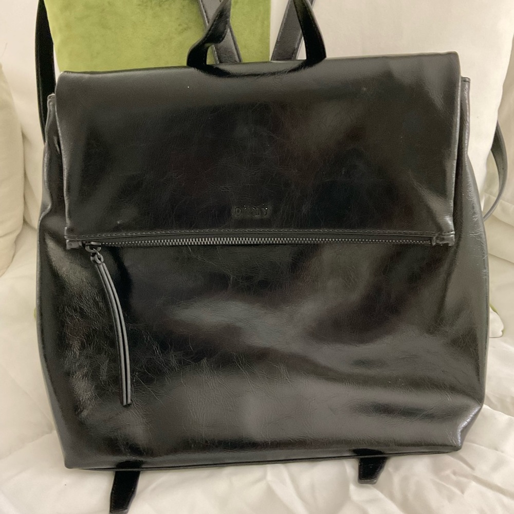 Like brand new carried  once dinky black backpack purse